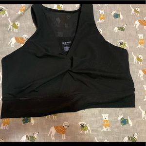 Cute Nine West sports bra. Mesh panel in the back, soft cups that are removal